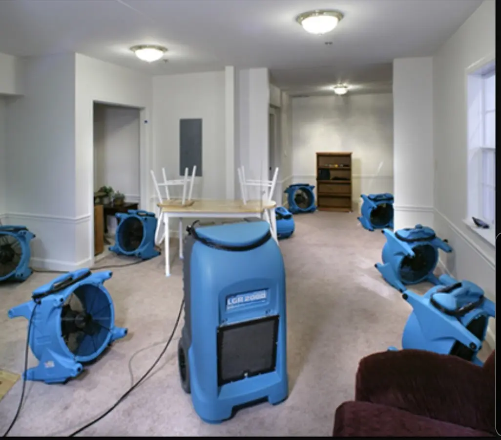 Air movers and dehumidifier setup for Water Damage Restoration in Florida Ridge